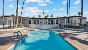 Manufactured home swimming pool with fenced